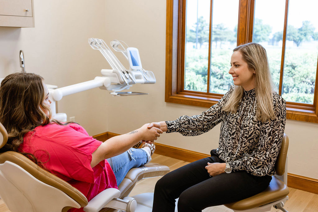 Woman smiling with SureSmile Dentist in Edmond OK